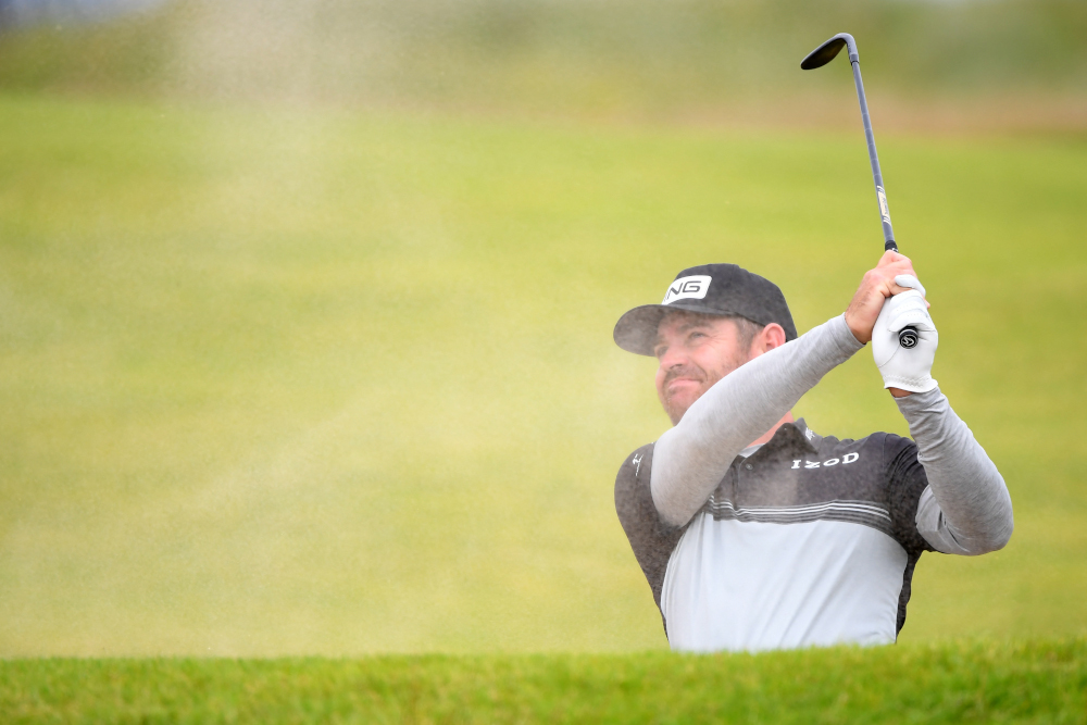 South Africau00e2u20acu2122s Louis Oosthuizen plays from a bunker on the 18th hole during his first round 64 on day one of The 149th British Open Golf Championship at Royal St Georgeu00e2u20acu2122s, Sandwich in south-east England July 15, 2021. u00e2u20acu201d AFP picnn