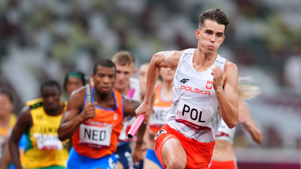Kajetan Duszynski of Poland in action during Heat 2 of the mixed 4x400m Relay at the Olympic Stadium, Tokyo, July 30, 2021. u00e2u20acu201d Reuters picnn