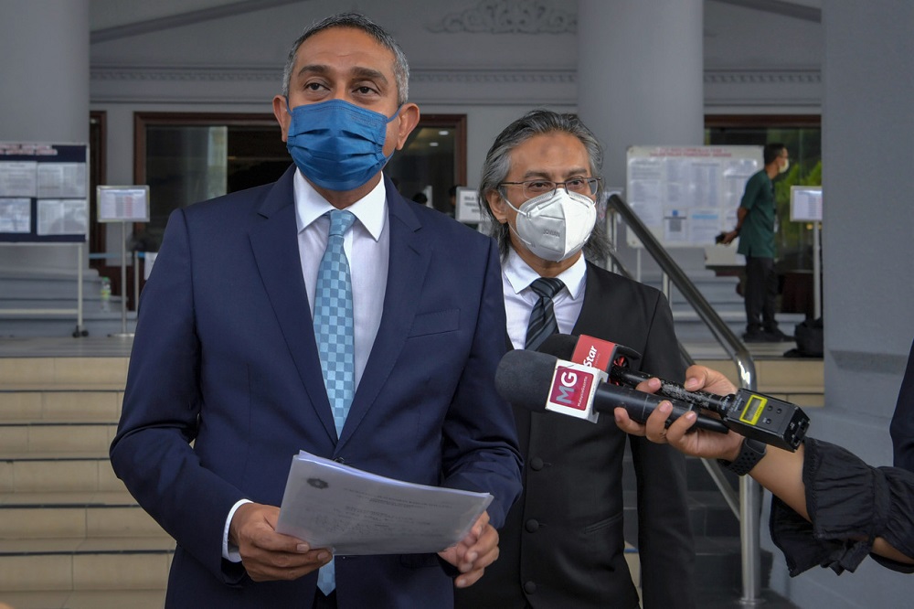 Umno lawyer Datuk Mohd Hafarizam Harun speaks to reporters outside the Sessions Court in Kuala Lumpur July 30, 2021. u00e2u20acu2022 Bernama pic