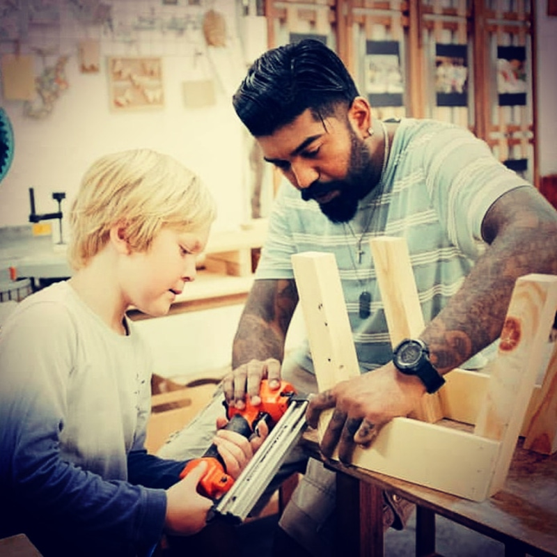 Nicholas teaching a student wood working before the pandemic. u00e2u20acu201d Picture courtesy of Nicholas Pereira  