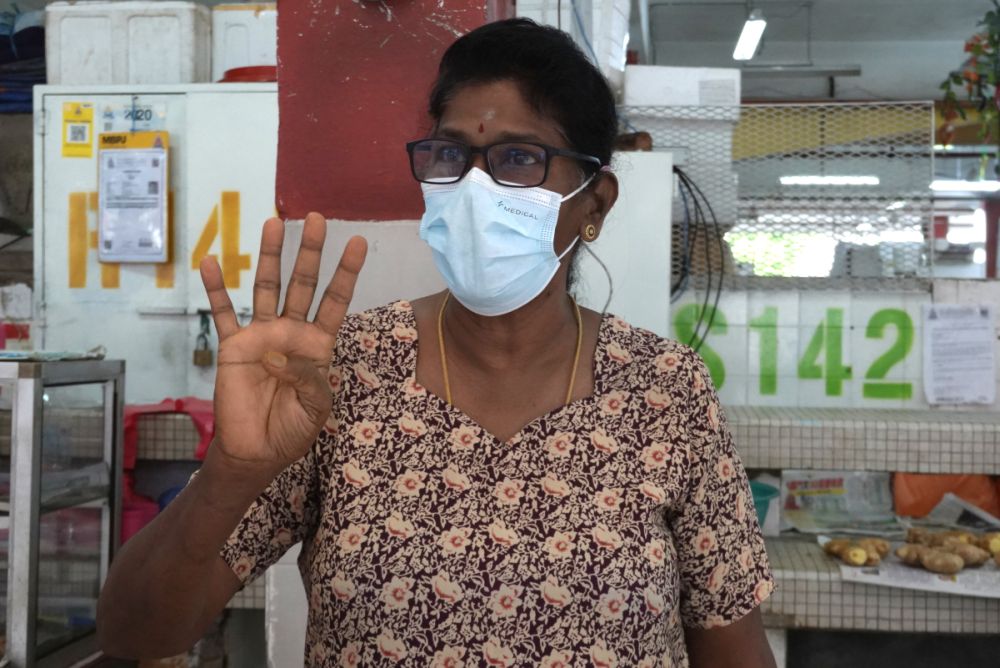Kanaga Ambigai speaks during an interview with Malay Mail at the Jalan Othman Wet Market, Petaling Jaya ahead of the enhanced movement control order on July 2, 2021. — Picture by Miera Zulyana