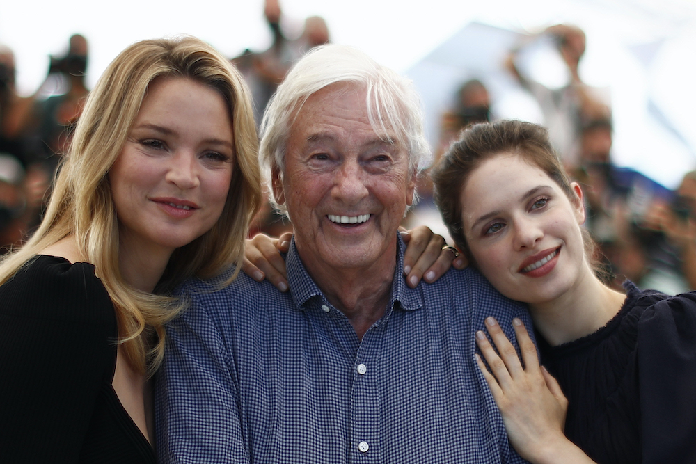 Director Paul Verhoeven and cast members Virginie Efira and Daphne Patakia pose at the 74th Cannes Film Festival in Cannes, July 10, 2021. u00e2u20acu201d Reuters pic
