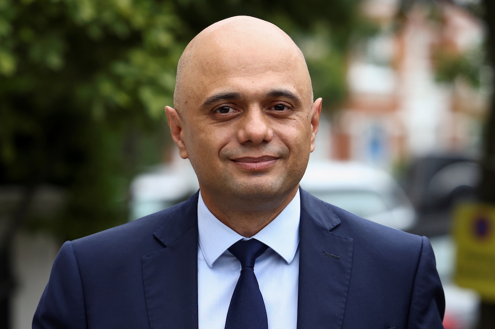 Britainu00e2u20acu2122s new Health Secretary Sajid Javid walks outside his home in London, Britain June 27, 2021. u00e2u20acu201d Reuters picnn