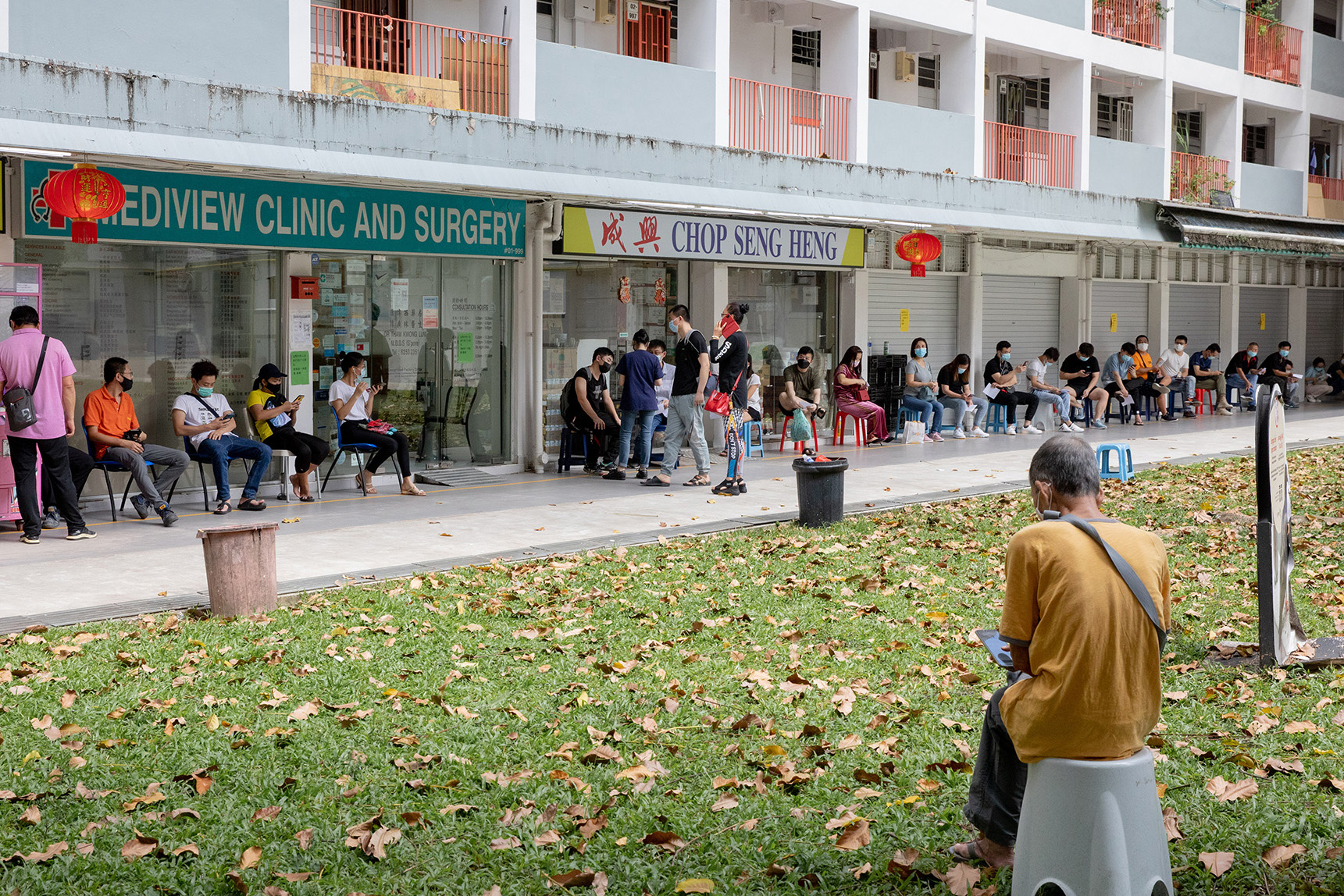 People queuing for the Sinovac Covid-19 vaccine outside Mediview Clinic and Surgery at Lorong 1 Toa Payoh on July 2, 2021. u00e2u20acu201d Photo by Ili Nadhirah Mansor for TODAY