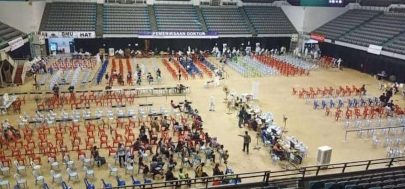 A second photo showed more people entering Stadium Malawati CAC. — Picture from Facebook/Kementerian Kesihatan Malaysia