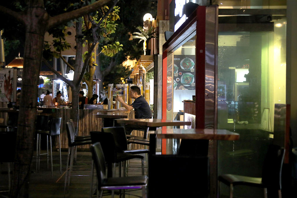 The Singapore Nightlife Business Association said that as the industry navigates through the pandemic, it will work with relevant agencies to support nightlife establishments that have changed their operations. u00e2u20acu2022 TODAY pic