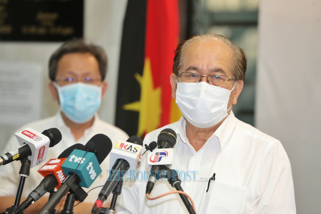 Datuk Amar Douglas Uggah Embas speaks during a press conference yesterday as Minister of Local Government and Housing Datuk Seri Dr Sim Kui Hian (left) look on.  u00e2u20acu201d  Picture by Chimon Upon via Borneo Post Online