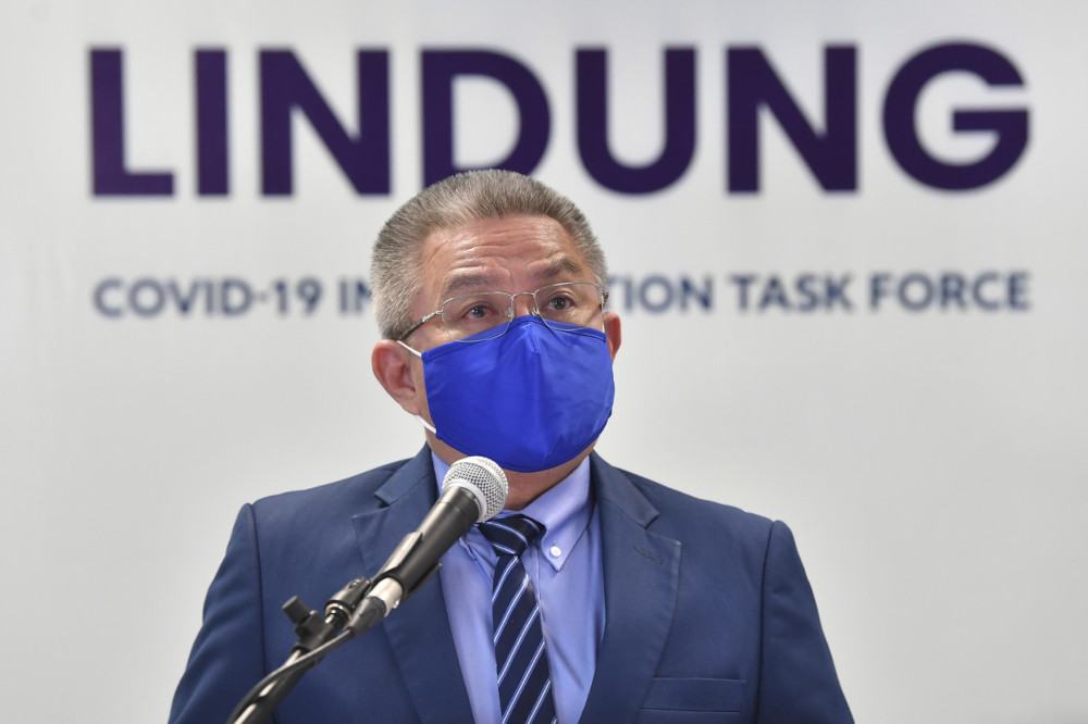 Health Minister Datuk Seri Dr Adham Baba speaks to the media during the National Covid-19 Immunisation Task Force briefing in Putrajaya, July 5, 2021. u00e2u20acu201d Bernama pic 