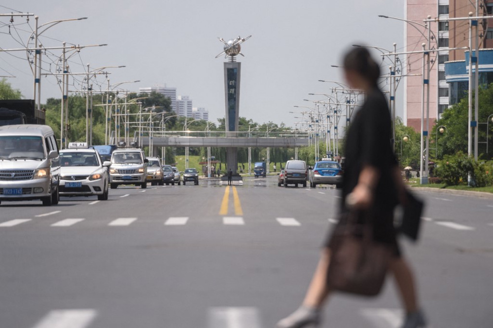 Traffic makes its way along a street during high temperatures reaching 34 degrees Celsius in Pyongyang on July 21, 2021. u00e2u20acu201d AFP pic