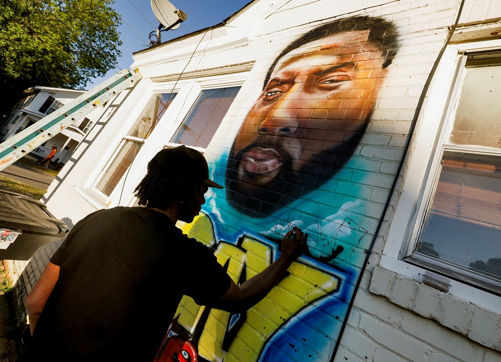 Ulysses Edwards, a friend of Andrew Brown Jr, finishes a mural in his honour at the site where sheriff's deputies killed Brown in Elizabeth City, North Carolina May 1, 2021. u00e2u20acu2022 Reuters file pic
