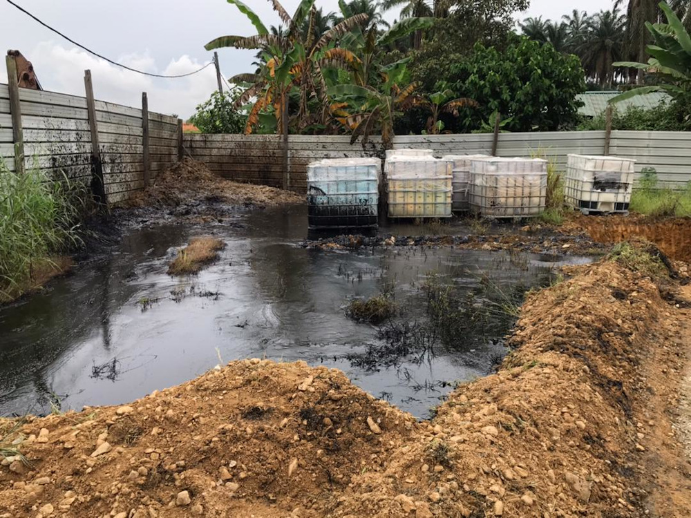 A leaked substance from a storage warehouse flowed into the river at Jalan Besar Kampung Baru, Sengkang in Kulai July 4, 2021. u00e2u20acu201d Picture via Twitter/Bernama