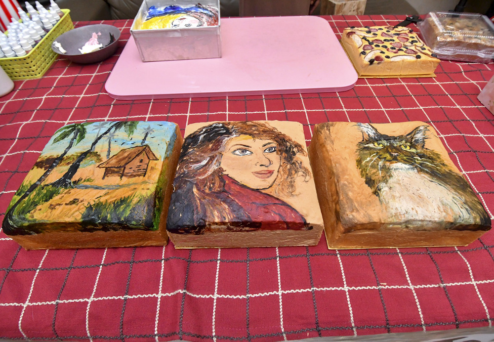 Marble cakes featuring scenery, a woman and a cat made by Aftisa Ahmad Fahmy are seen at her home in Kampung Belukar, Panji July 13, 2021. u00e2u20acu201d Bernama pic