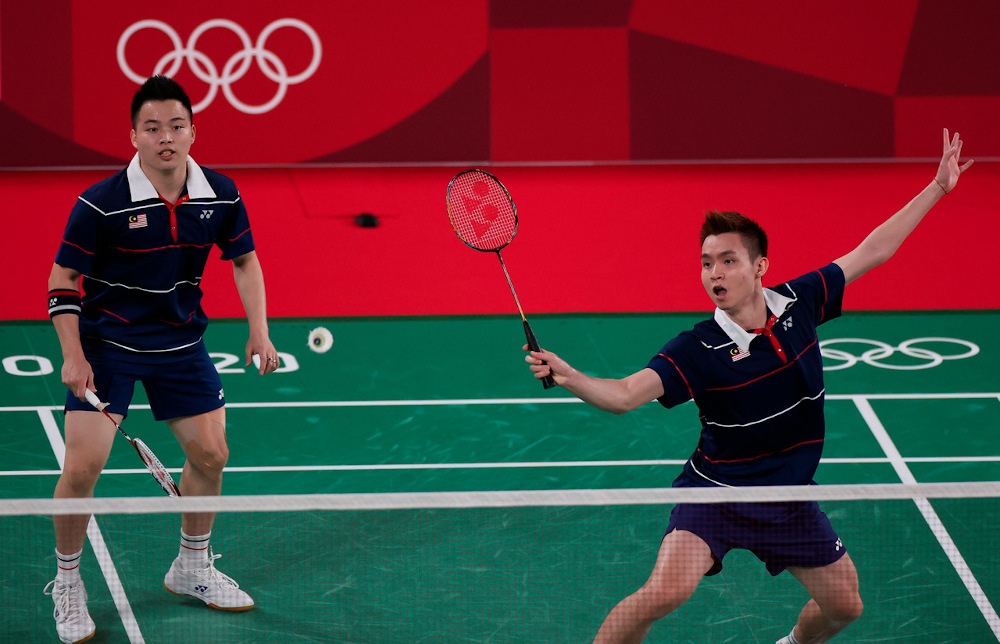 Malaysiau00e2u20acu2122s menu00e2u20acu2122s badminton squad Aaron Chia and Soh Wooi Yik against Canadau00e2u20acu2122s Nyl Kiyoshi Yakura and Jason Anthony Ho-Shue during Group D match at the Tokyo 2020 Olympic Games at Mushashino Sports Plaza in Tokyo July 27, 2021. u00e2u20acu201d Bernama pic