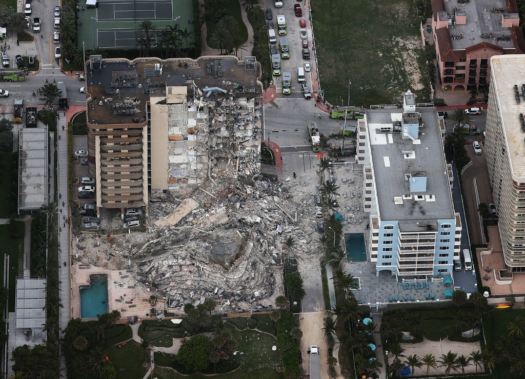 Search and Rescue personnel work after the partial collapse of the 12-story Champlain Towers South condo building on June 24, 2021 in Surfside, Florida. u00e2u20acu201d Getty Images via AFP