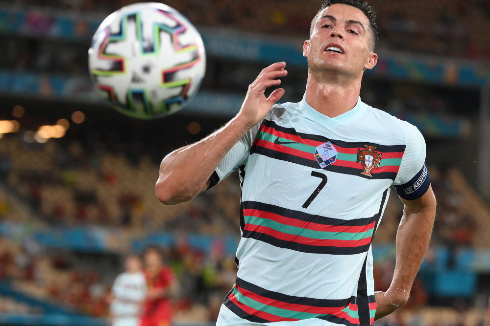 Portugalu00e2u20acu2122s forward Cristiano Ronaldo runs for the ball during the Uefa Euro 2020 round of 16 football match between Belgium and Portugal at La Cartuja Stadium in Seville June 27, 2021. u00e2u20acu201d AFP picnn