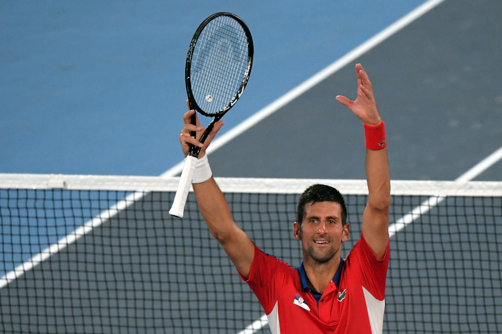 Serbiau00e2u20acu2122s Novak Djokovic celebrates defeating Japanu00e2u20acu2122s Kei Nishikori during their Tokyo 2020 Olympic Games menu00e2u20acu2122s singles quarterfinal tennis match at the Ariake Tennis Park in Tokyo July 29, 2021. u00e2u20acu201d AFP pic 