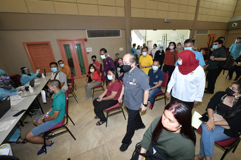Sarawak Deputy Chief Minister Datuk Amar Douglas Uggah Embas visits the vaccination centre (PPV) at the Lundu Community Hall, July 6, 2021. u00e2u20acu201d Bernama picnn