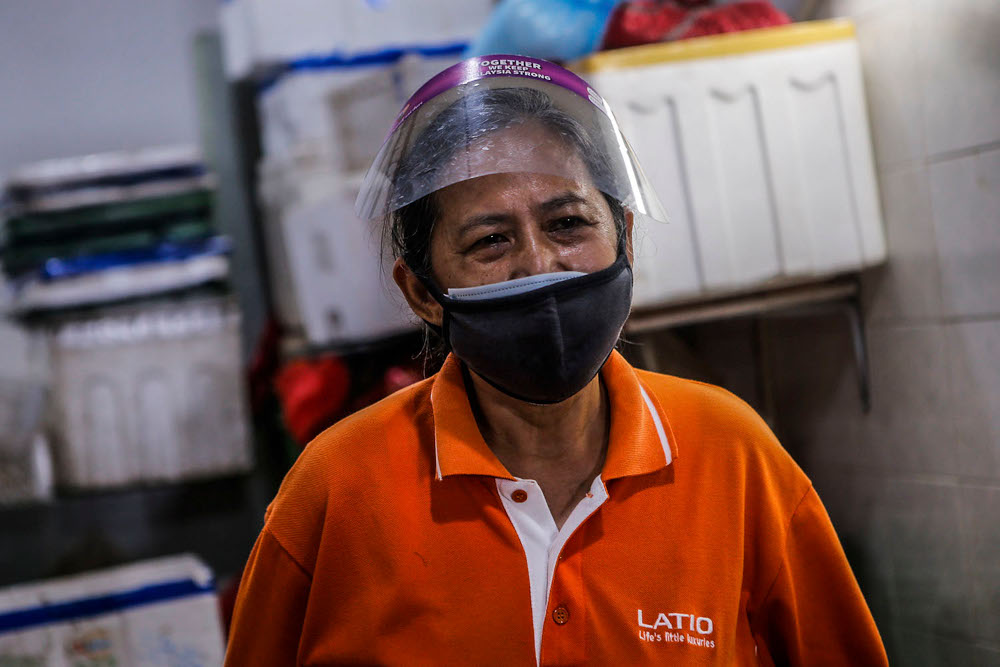 Vegetable seller Kim speaks to Malay Mail during an interview at UTC Sentul July 2, 2020. — Picture by Hari Anggara