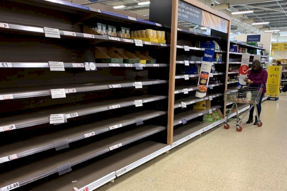 A woman pushes her trolley along the empty pasta aisle inside a Tesco supermarket amid the coronavirus disease (Covid-19) outbreak in Manchester, Britain, March 21, 2020. u00e2u20acu201d Reuters pic
