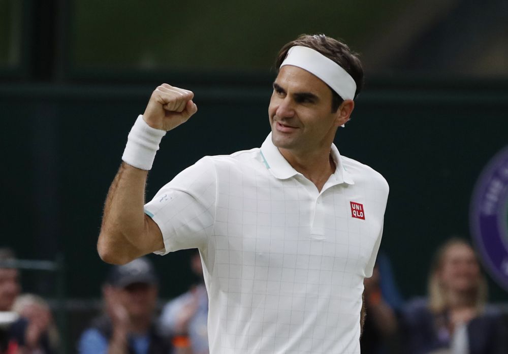 Switzerland's Roger Federer celebrates winning his fourth round match against Italy's Lorenzo Sonego at the All England Lawn Tennis and Croquet Club, London July 5, 2021. u00e2u20acu201d Reuters pic