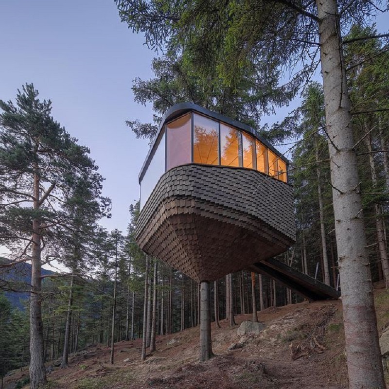 In Norway, the Woodnest treehouse cabins overlook a fjord. u00e2u20acu2022 Picture via Instagram