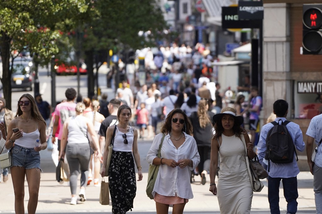 Pedestrians walk on Oxford street in central London on July 19, 2021 as coronavirus restrictions are lifted. u00e2u20acu201d AFP pic