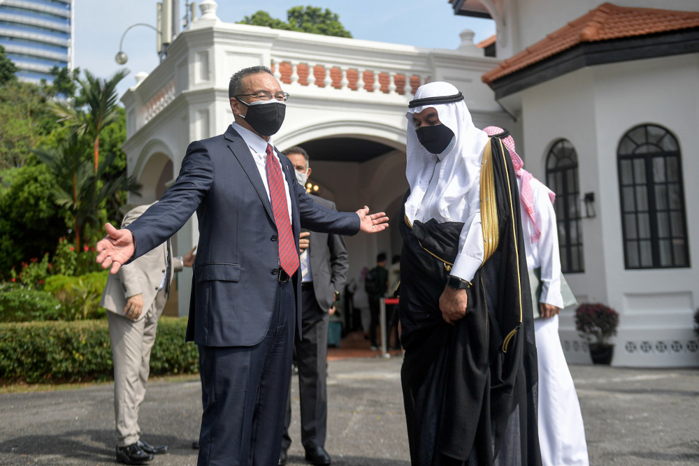 Senior Foreign Minister (Security Cluster) Datuk Seri Hishammuddin Hussein with Saudi Arabiau00e2u20acu2122s Ambassador to Malaysia Datuk Mahmoud Hussien Saeed Qattan  at the Institute Of Strategic & International Studies, July 30, 2021. u00e2u20acu201d Bernama picn