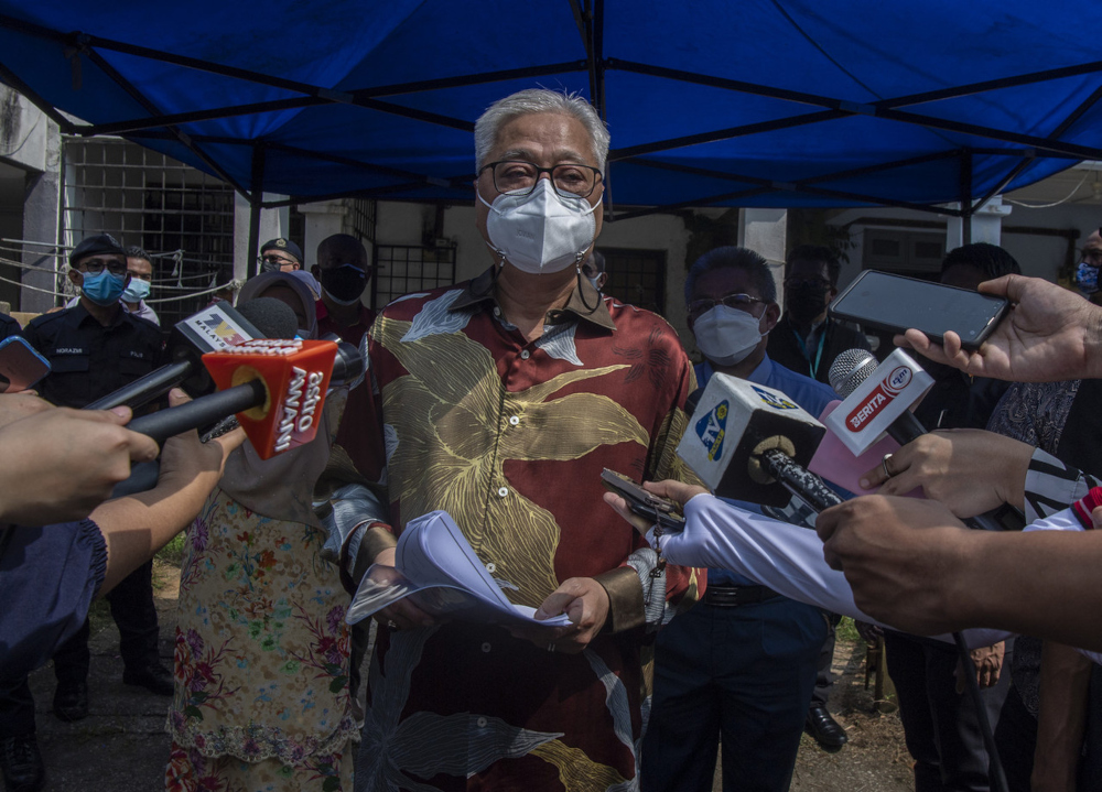 Deputy Prime Minister Datuk Seri Ismail Sabri Yaakob speaks to the media after visiting eight siblings who lost their parents to Covid-19 in Bukit Beruntung, July 22, 2021. u00e2u20acu201d Bernama picnn
