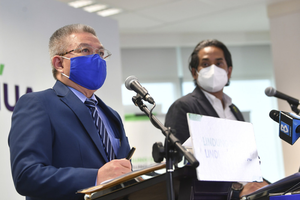 Health Minister Datuk Seri Dr Adham Baba speaking at the weekly Covid-19 Immunisation Task Force joint press conference with Science, Technology and Innovation Minister Khairy Jamaluddin in Putrajaya, July 5, 2021. u00e2u20acu201d Bernama picn