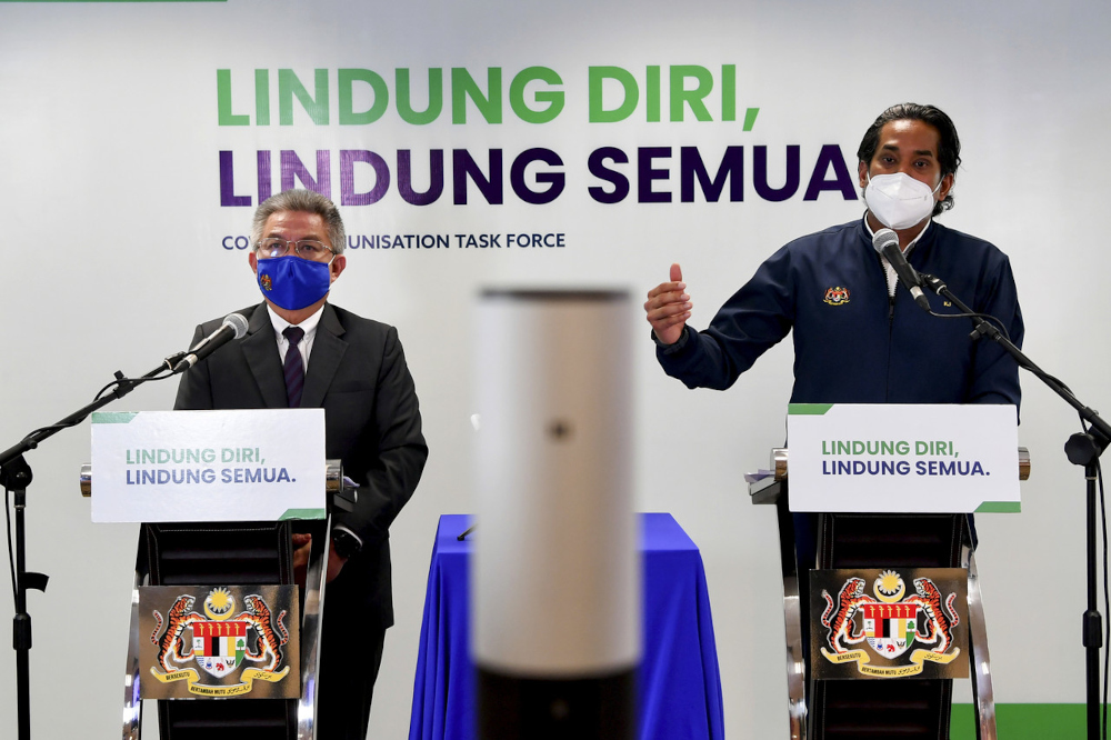 Science, Technology and Innovation Minister Khairy Jamaluddin and Health Minister Datuk Seri Dr Adham Baba at the weekly Covid-19 Immunisation Task Force (CITF) press conference in Putrajaya, July 23, 2021. u00e2u20acu201d Bernama pic 