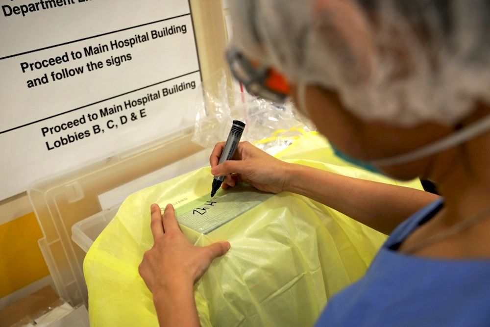 Healthcare workers have to forgo leave, wedding plans and other personal engagements to support each other at work. — Nuria Ling pic via TODAY