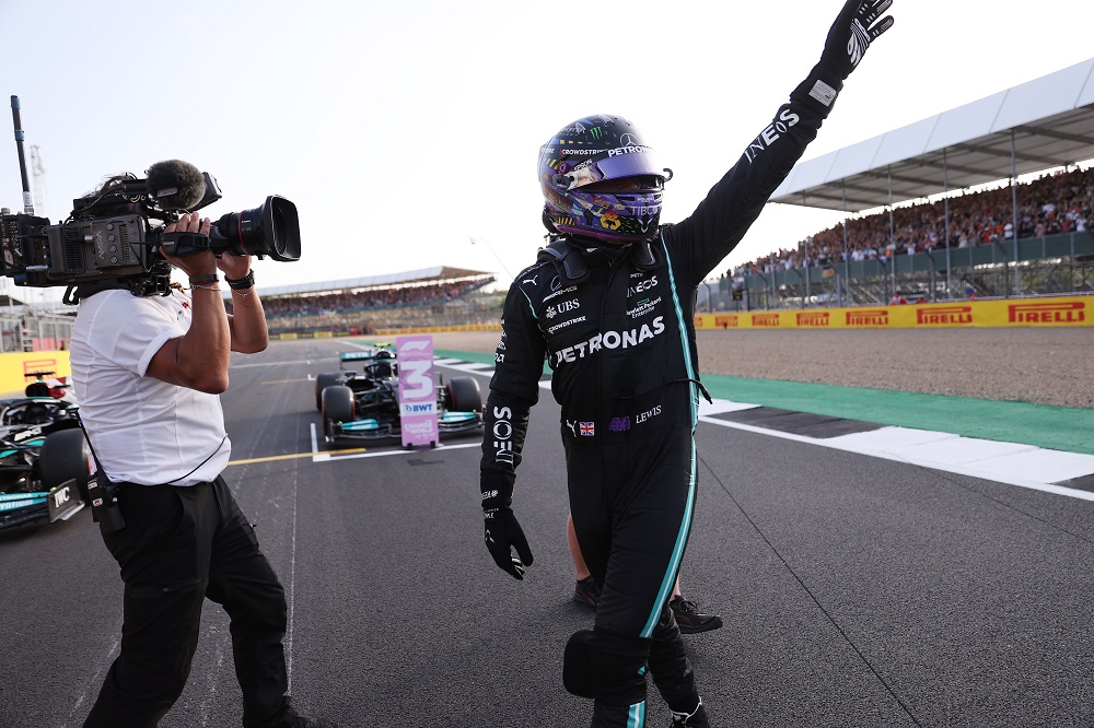 Mercedes' Lewis Hamilton celebrates after finishing first in the sprint race qualifying session at the Silverstone Circuit July 17, 2021. u00e2u20acu2022 Pool via Reuters/Lars Baron