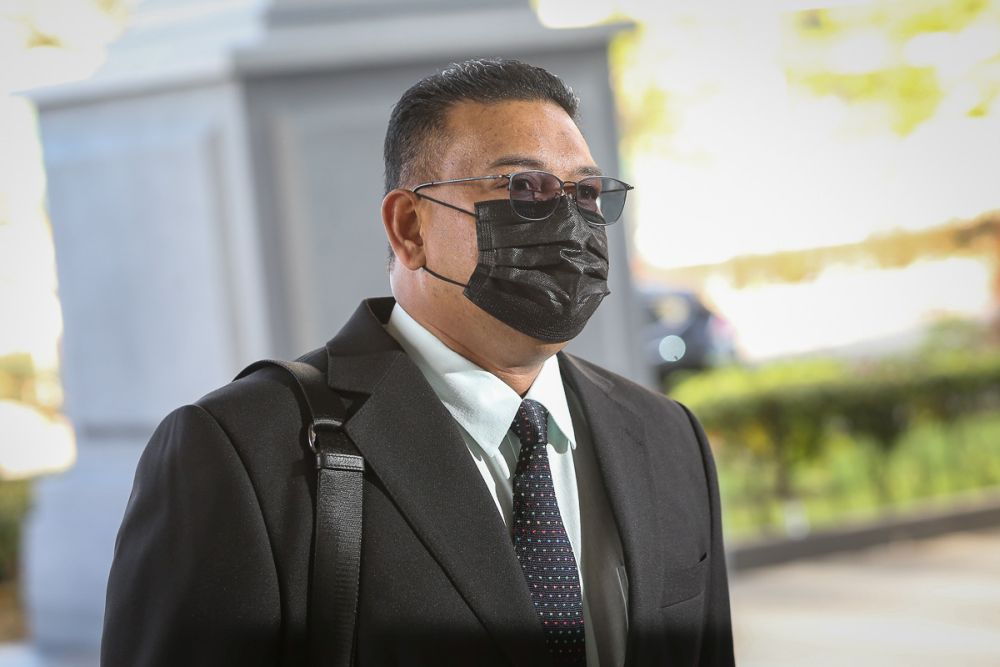 Datuk Lokman Noor Adam arrives at the Kuala Lumpur High Court July 15, 2021. u00e2u20acu201d Picture by Yusof Mat Isa