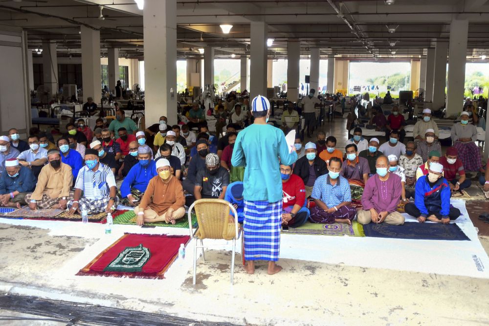 An imam leads Aidiladha prayers at the Covid-19 Low-Risk Quarantine and Treatment Centre at the Malaysia Agriculture Expo Park 2 in Serdang on Hari Raya Aidiladha July 20, 2021. u00e2u20acu201d Bernama pic