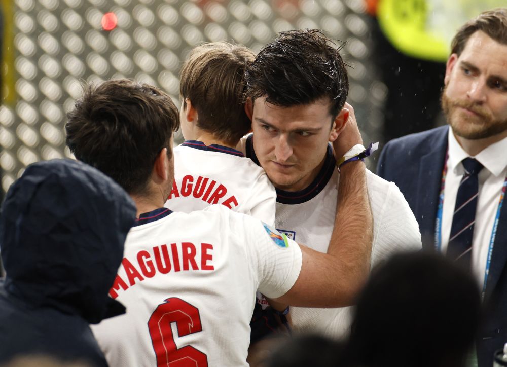 England's Harry Maguire is pictured with his family after the match against Italy at Wembley, London July 11, 2021. u00e2u20acu201d Reuters picnn