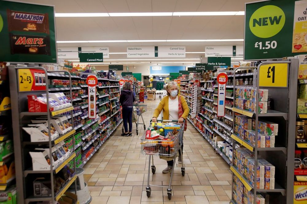 A customer wearing a protective face mask shops at a Morrisons store in St Albans, Britain, September 10, 2020. u00e2u20acu201d Reuters pic