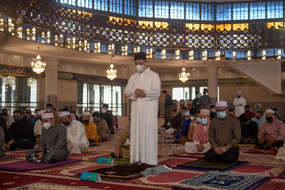 Prime Minister Tan Sri Muhyiddin Yassin performs Aidiladha prayers at the National Mosque in Kuala Lumpur July 20, 2021. u00e2u20acu201d Bernama pic