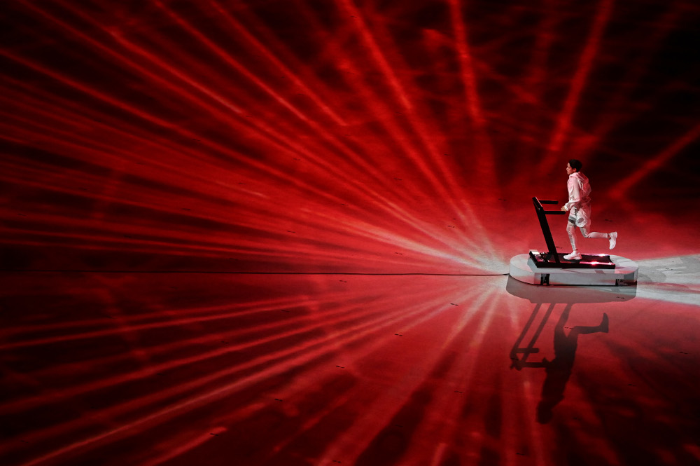 Nurse/boxer Arisa Tsubata performs during the opening ceremony of the Tokyo 2020 Olympic Games, at the Olympic Stadium, in Tokyo, July 23, 2021. — AFP pic 