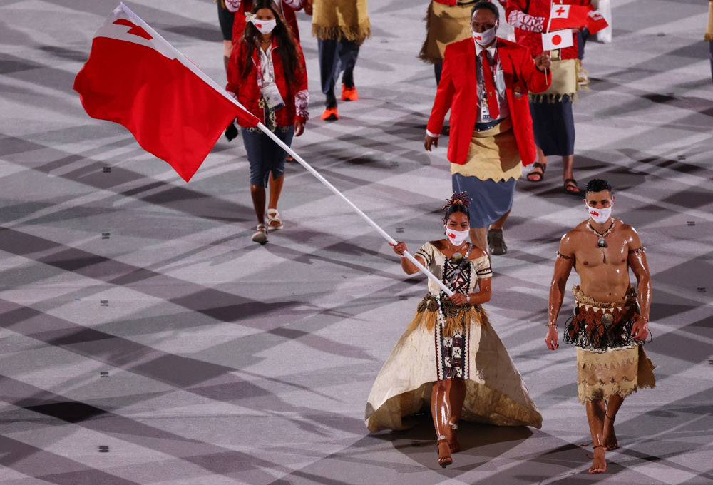 Flag bearer Malia Paseka of Tonga and PitaTaufatofua of Tonga lead their contingent during the athletes parade at the Tokyo 2020 Olympics Opening Ceremony at the Olympic Stadium, Tokyo, Japan, July 23, 2021. u00e2u20acu201d Reuters pic 