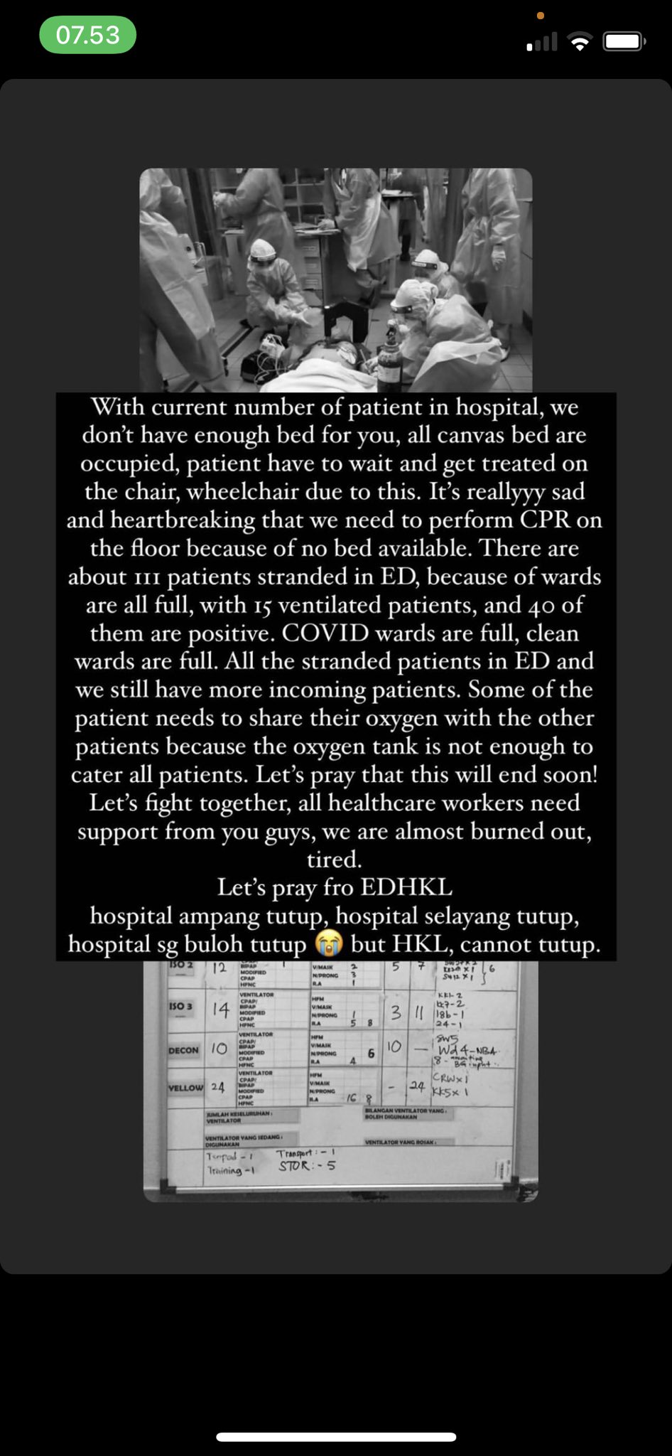 This picture taken from social media shows health workers attending to a patient on the floor. — Picture via Twitter/@azirasalfarina 