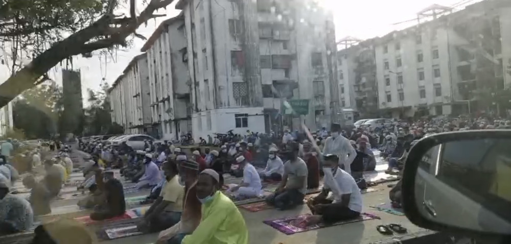 A crowd of around 200 people performing Aidiladha prayers outside a surau in Juru, Penang July 20, 2021. u00e2u20acu201d Video screencap from social media