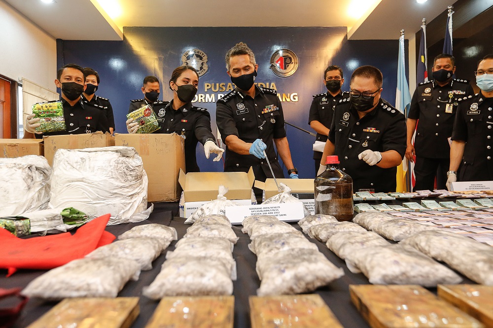 Penang CPO Datuk Mohd Shuhaily Mohd Zain shows the seized drugs during a press conference in George Town July 14, 2021. u00e2u20acu2022 Picture by Sayuti Zainudin