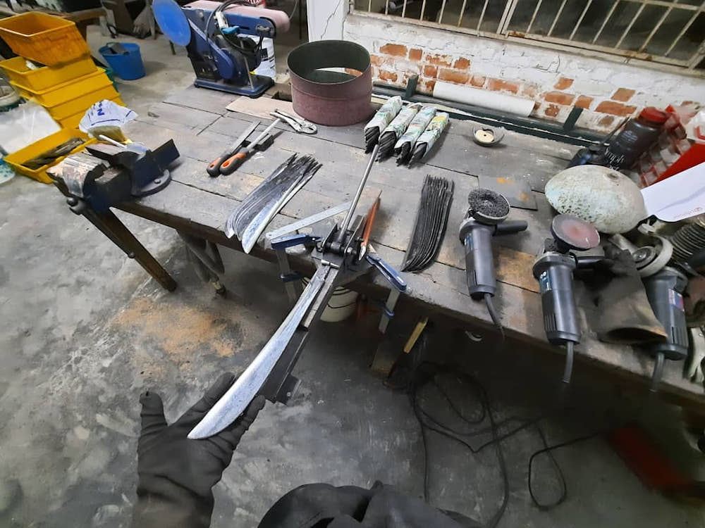 Ahmad Nadir Askandar making a ‘parang’ at his workshop. — Picture courtesy of Ahmad Nadir Askandar