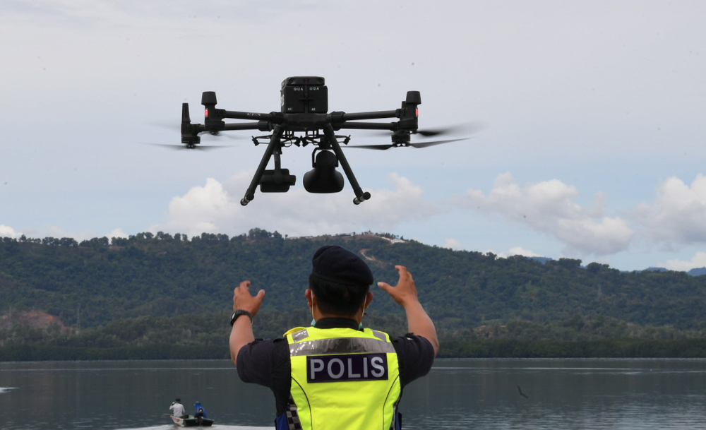 Tuaran district police chief DSP Mohd Hamizi Halim said the announcements and aerial surveillance of the area were carried out using the G-12 UAV drone model. u00e2u20acu201d Bernama pic 
