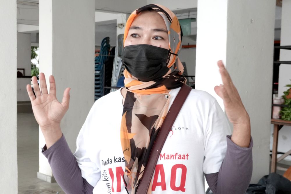 Kerinchi PPR resident Salmiah Sodeh speaks to Malay Mail during an interview in Kuala Lumpur July 2, 2021. — Picture by Miera Zulyana