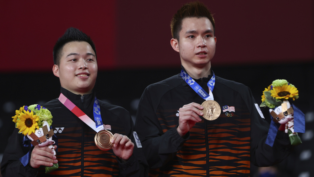 Bronze medallists Malaysiau00e2u20acu2122s Aaron Chia and Soh Wooi Yik pose with their bronze medals after the Tokyo 2020 Olympics badminton Menu00e2u20acu2122s Doubles medal ceremony at Musashino Forest Sport Plaza, Tokyo July 31, 2021. u00e2u20acu201d Reuters pic