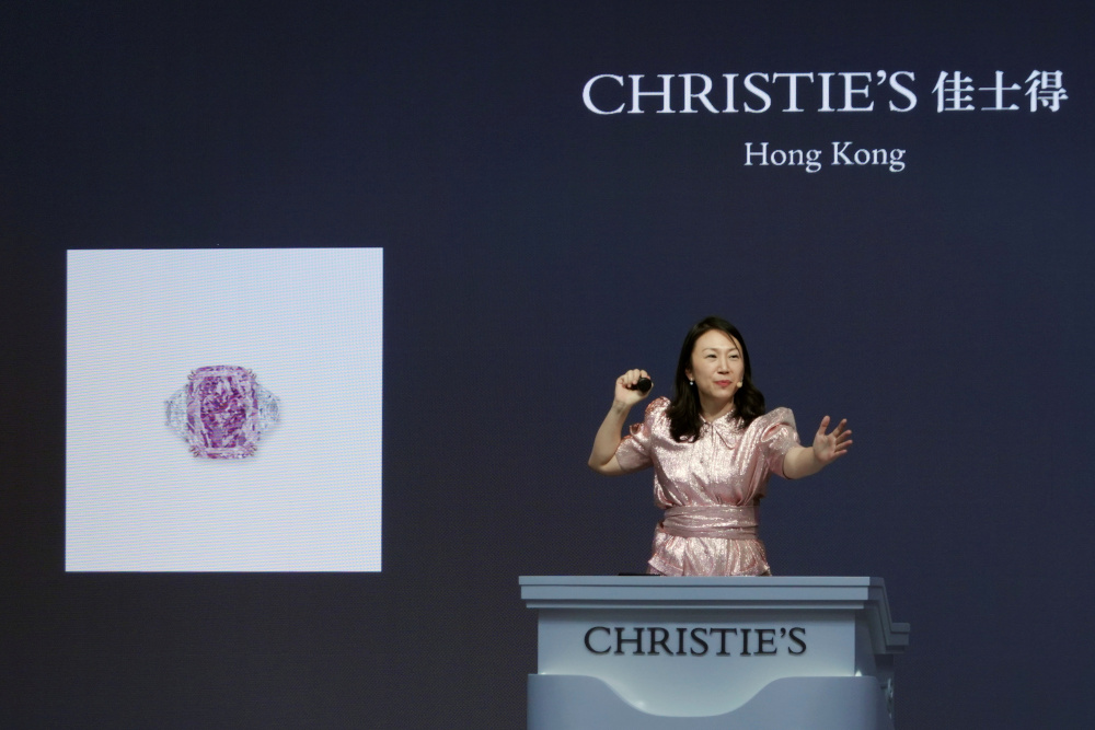 An auctioneer holds the gavel during Christieu00e2u20acu2122s auction of Sakura Diamond, a 15.81 carat purple pink diamond ring, in Hong Kong May 23, 2021. u00e2u20acu201d Reuters pic