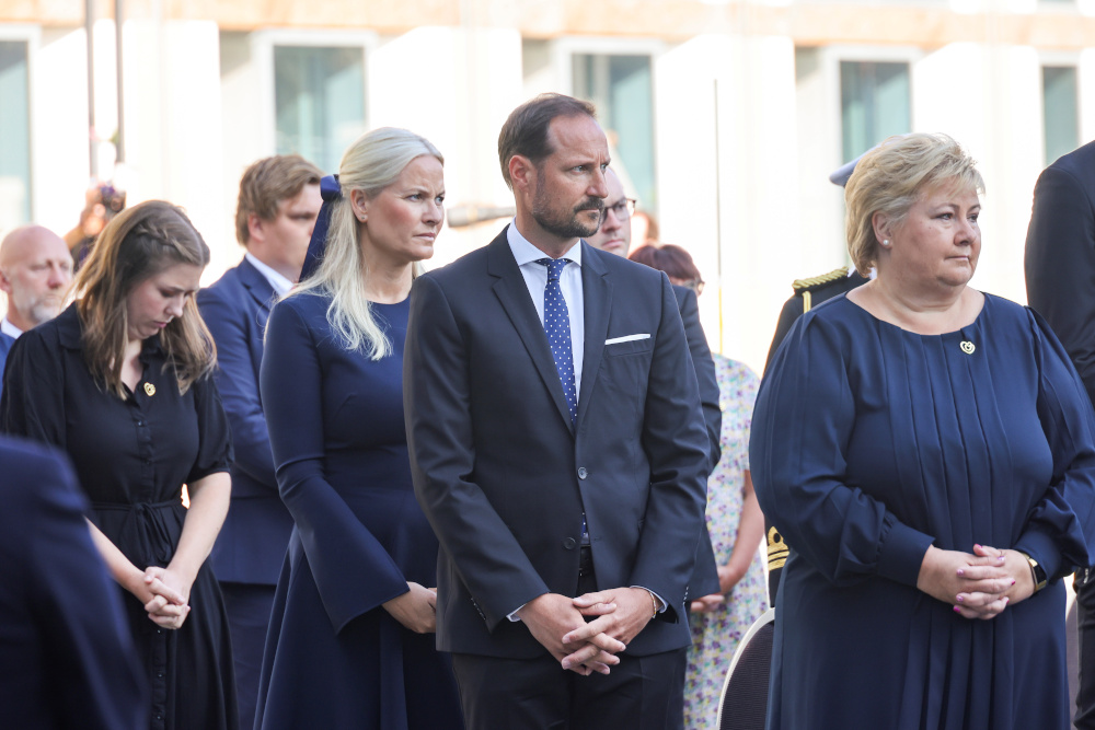 Norwayu00e2u20acu2122s Crown Prince Haakon, Crown Princess Mette-Marit, and Prime Minister Erna Solberg attend a memorial service ten years after the Oslo and Utoeya island bomb attack, in Oslo July 22, 2021. u00e2u20acu201d NTB/Geir Olsen pic via Reuters