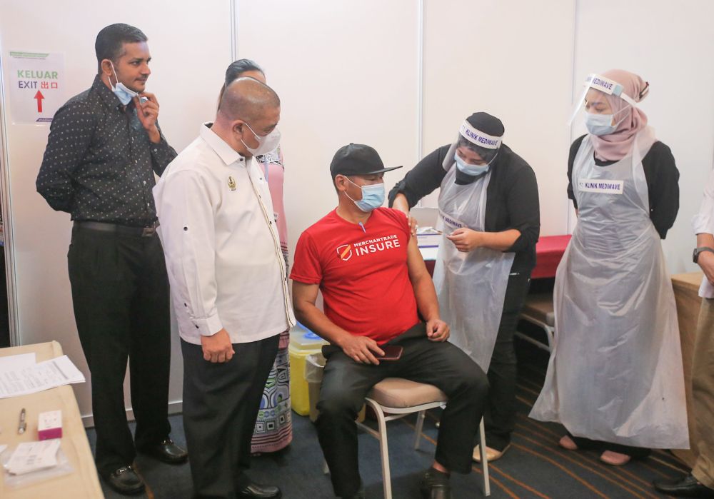 Perak Mentri Besar Datuk Saarani Mohamad visits the Public-Private Partnership Covid-19 Industry Immunisation Programme (Pikas) vaccination centre at Hotel Casuarina Meru in Ipoh July 23, 2021. u00e2u20acu201d Picture by Farhan Najib