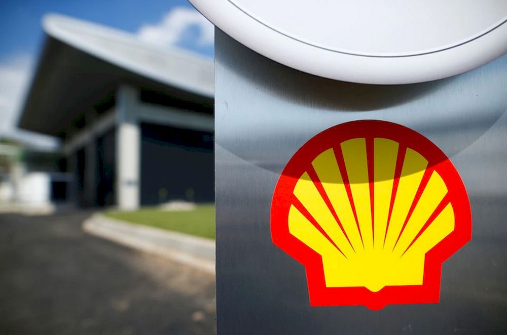 The logo of Royal Dutch Shell is pictured during a launch event for a hydrogen electrolysis plant at Shellu00e2u20acu2122s Rhineland refinery in Wesseling near Cologne, Germany, July 2, 2021. u00e2u20acu201dReuters pic
